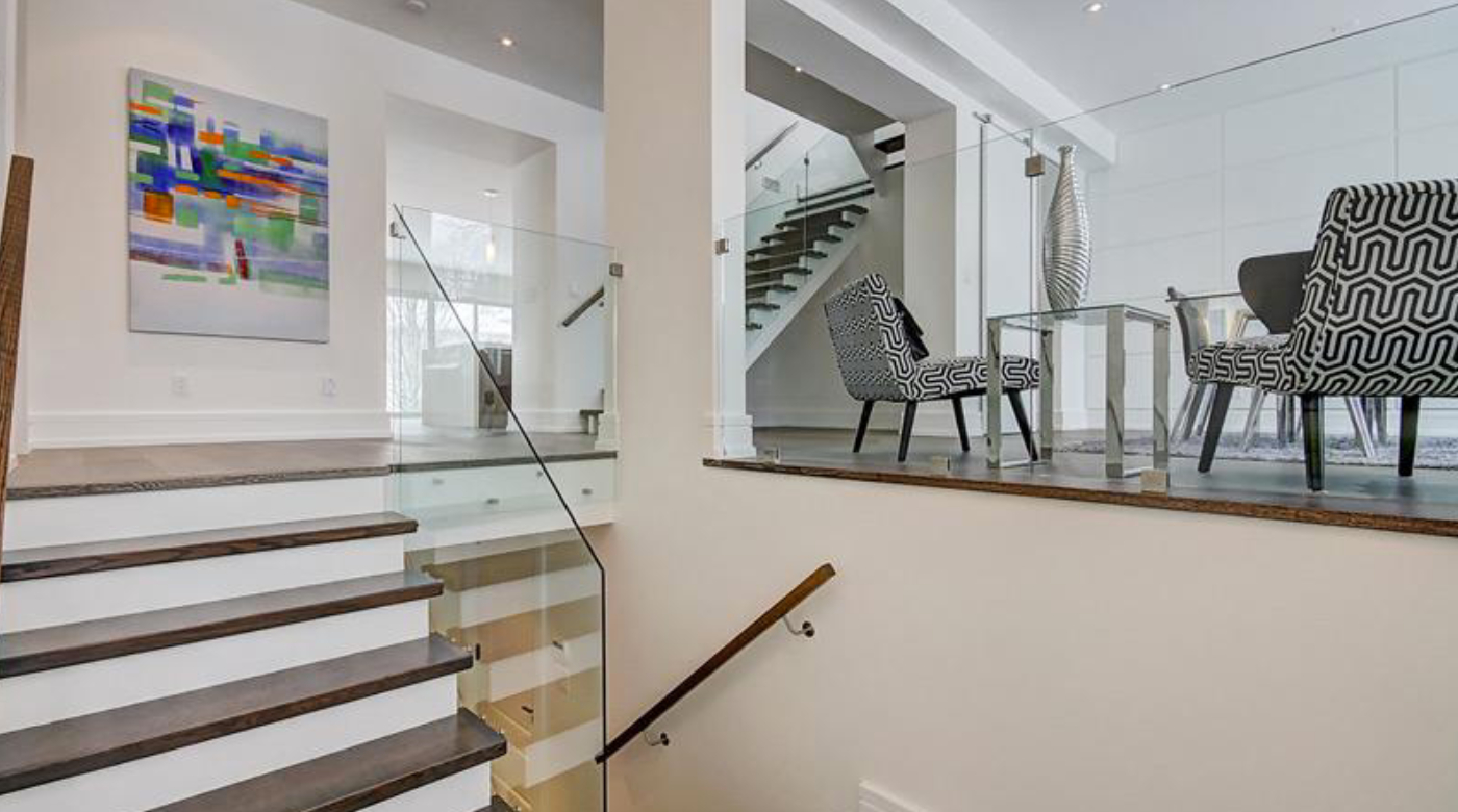 A house with glass railings and partition