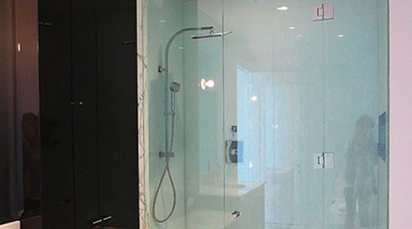 bathroom with glass shower door