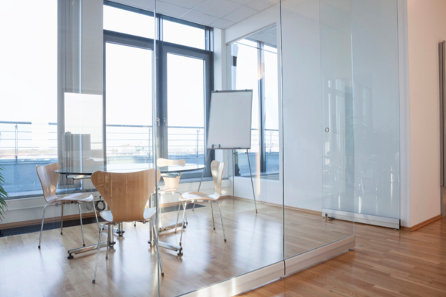 Office interior: Tempered glass table and separations
