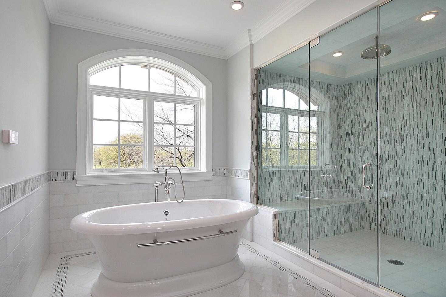 A beautiful glass bathroom.