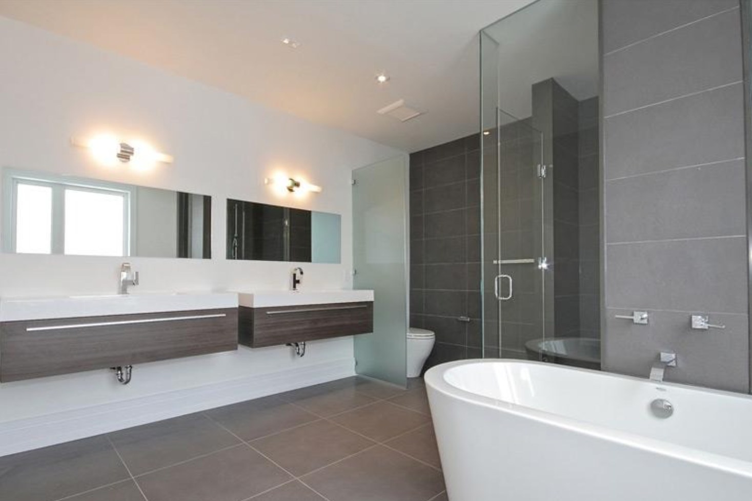 Custom mirrors in a modern bathroom
