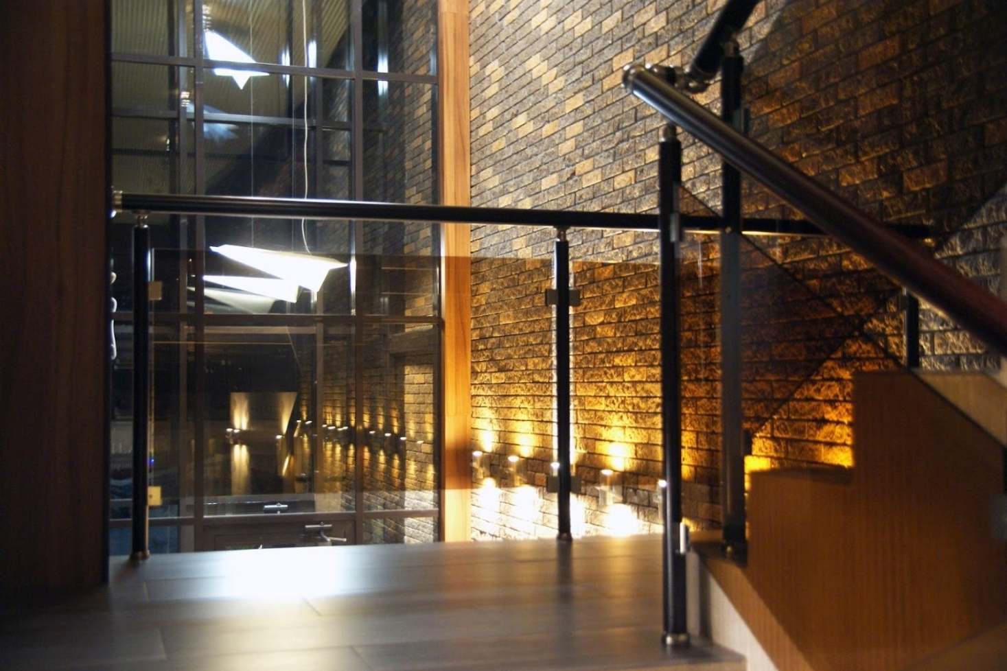 Glass staircase railing in hotel