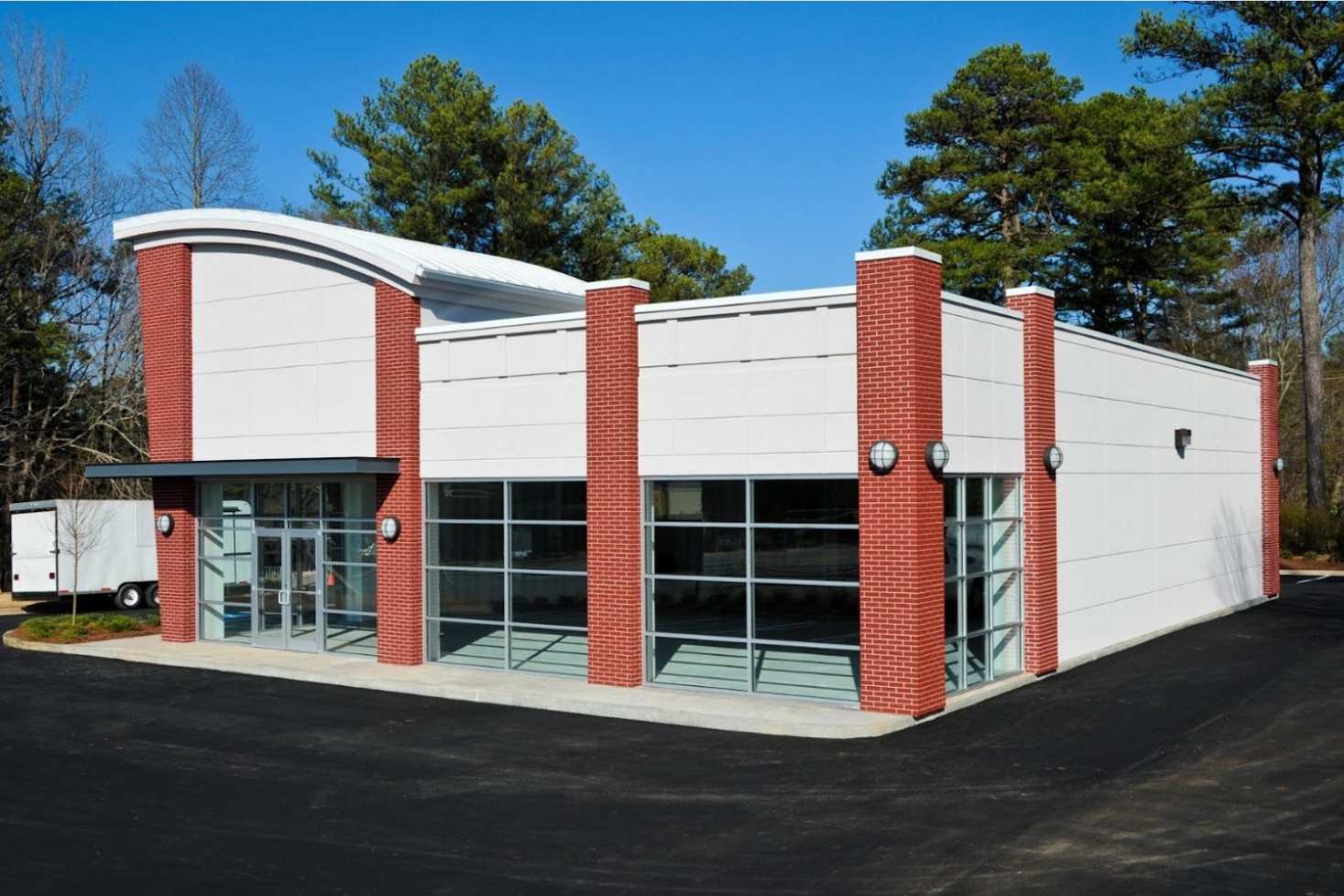 New commercial building with a glass facade.